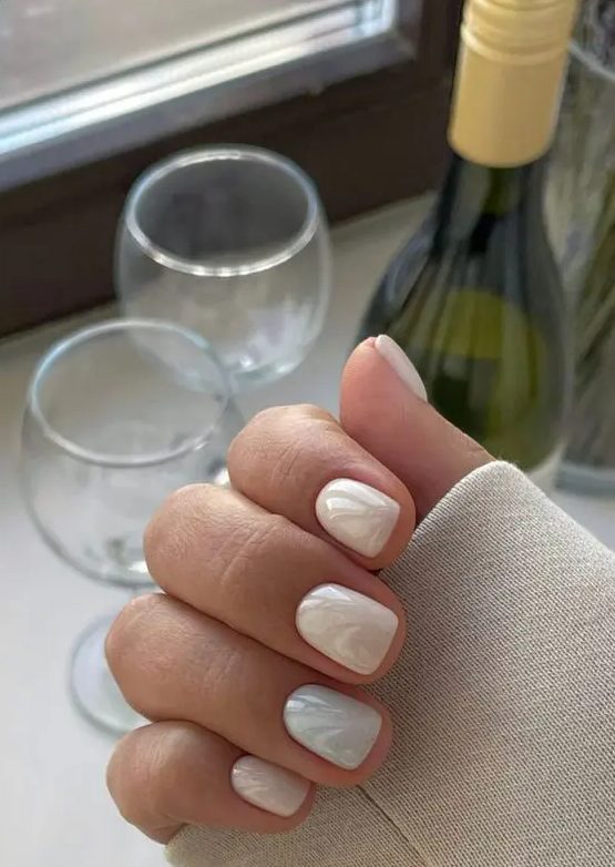 a super delicate pastel manicure done in tan and light green shades is a great idea for a spring or summer look