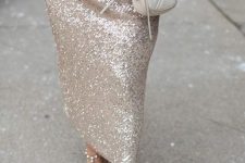 a white jumper, a gold sequin pencil maxi skirt, white spiked shoes and a creamy bag for a sophisticated holiday look