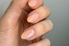 almond-shaped nails with peachy waves and abstract patterns are amazing for wearing them in spring and summer