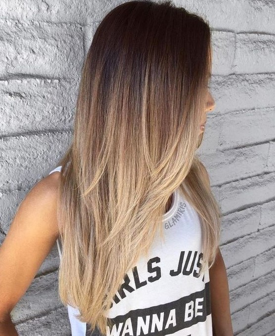 beautiful dark to bronde ombre cascading long hair looks very catchy, volume on straight hair is cool