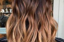beautiful medium-length hair from dark brunette to caramel and honey blonde, with volume and waves, is a fantastic solution