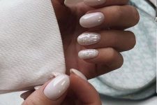 beautiful nude almond-shaped nails with holographic designs are amazing to rock, they are chic