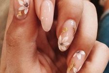 beautiful nude nails with a chic floral design and gold foil are an adorable solution for spring and summer