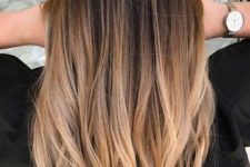 beautiful ombre long hair from dark brown to chestnut and bronde, with a lot of volume and texture, is adorable