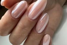 classy almond-shaped chrome blush nails are a beautiful solution for any girl, they look very up-to-date