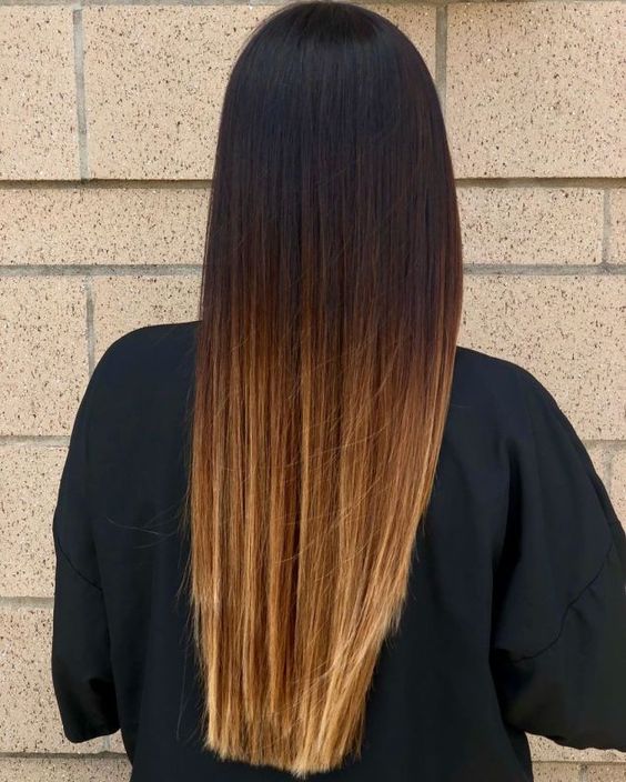 extra bold ombre long hair from black to copper and bronde, plus a lot of volume