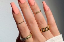 extra long coffin-shaped peachy nails are a super cool and catchy solution for a modern and bold look