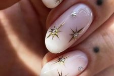 fantastic milky nails with gold stars with rhinestones are perfect for a celestial bride