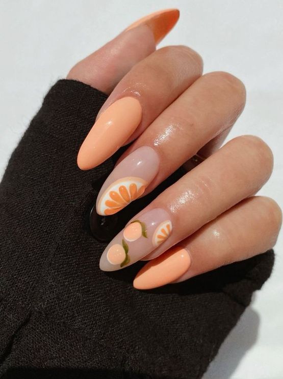 fruit Peach Fuzz nails with citrus and peach accent nails are cool for wearing them right now