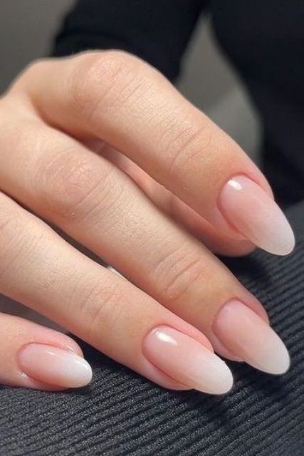 long almond-shaped nails done as an ombre version of French manicure are adorable for any occasion