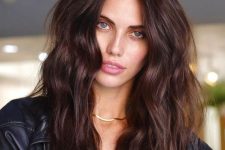 long and voluminous chocolate brown hair with waves is a cool idea, it looks verychic and very bold