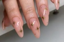 long dusty pink nails with gold stars and polka dots are amazing for a celestial wedding, they will be great for a celestial look