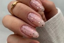 long nude nails with gold hexagons are amazing for a glam and cute look, who wants a bit of loveliness