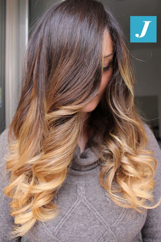 long ombre hair from dark brunette to caramel and golden blonde, with volume and waves, is an amazing idea