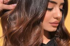 long shiny black hair with copper ombre, waves and volume is a fantastic idea to add color and dimension to your hair