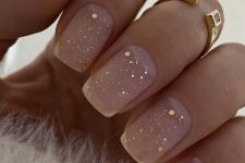 matte nude nails with rose gold glitter and gold sparkles are amazing for NYE, they will add a delicate touch of shine