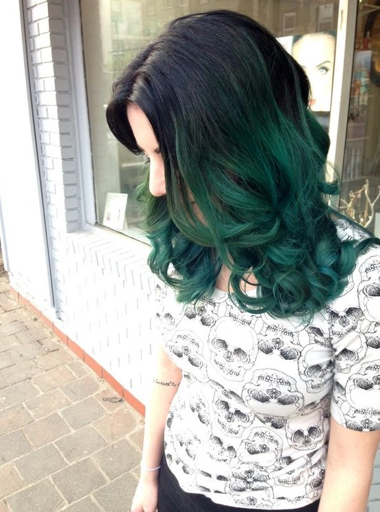 medium-length black hair with green ombre, volume and waves is an adorable and eye-catchy solution