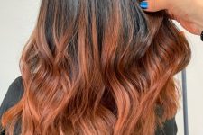 medium-length hair from black to copper, with volume and waves, is a lovely idea