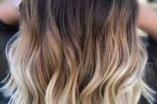 medium-length volumetric and wavy hair from dark brown to blonde is gorgeous and very bold