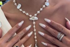 milky chrome almond-shaped nails are an ultimate idea for spring or summer, they will do for any outfit