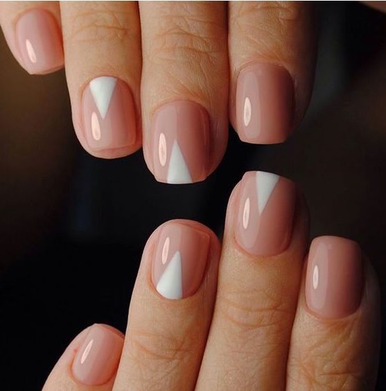 nude nails with white geometric touches for a bold and trendy modern look, perfect for those who love French