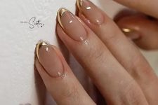nude wedding nails with shiny metallic gold tips look very chic, beautiful and glam and make your look wow