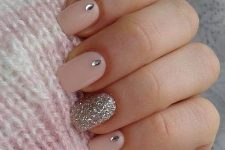 pink nails with a silver glitter accent one and some rhinestones are super glam, bright and chic