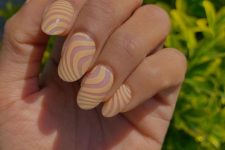 unique wavy print Peach Fuzz nails like these ones will catch an eye, they are perfect for spring and summer