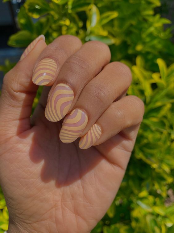 unique wavy print Peach Fuzz nails like these ones will catch an eye, they are perfect for spring and summer