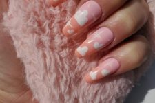 whimsical blush and Peach Fuzz cloud nails like these ones are amazing to catch an eye