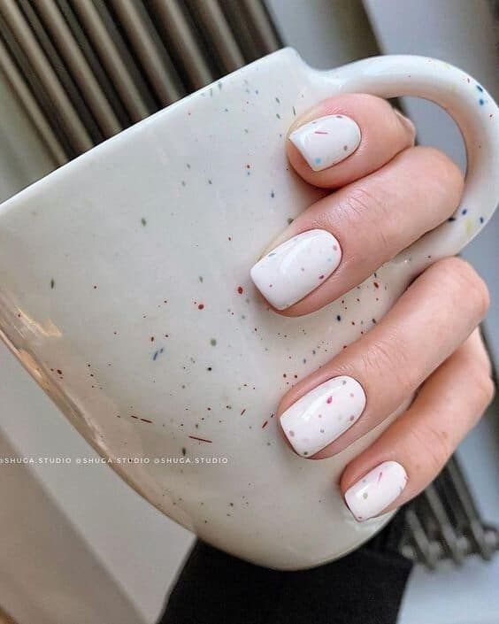white short square nails with colorful speckles are a great idea for spring or summer, and you can make such a design yourself