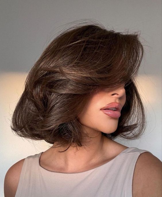 a lovely brown old money bob with volume and waves is a gorgeous idea to look sophisticated