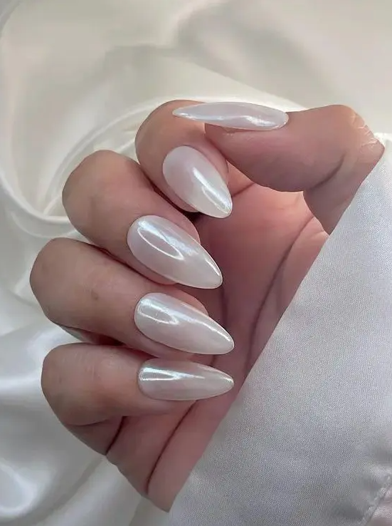 milky chrome long almond nails are the newest and trendiest perfection, they look bold and chic