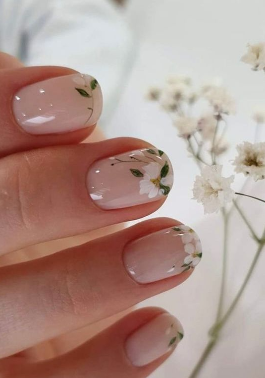 nude nails with a bit of white blooms painted on them will be a gorgeous solution for spring and summer