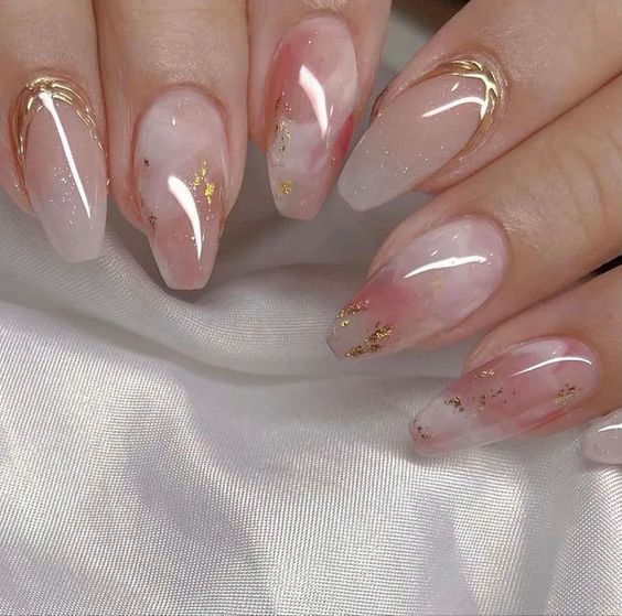a beautiful watercolor wedding manicure in blush, pink and creamy, with gold touches, is amazing for spring