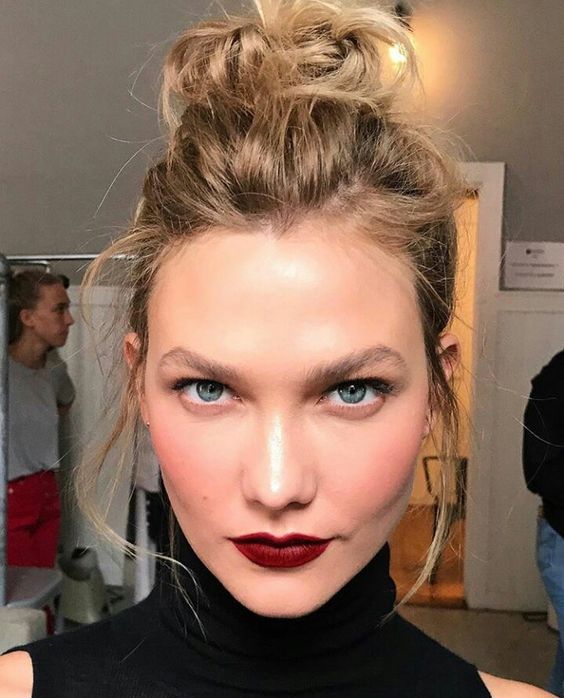 a messy top knot with some hair down and a messy volumetric top is a cool idea for almost any look, from casual to party