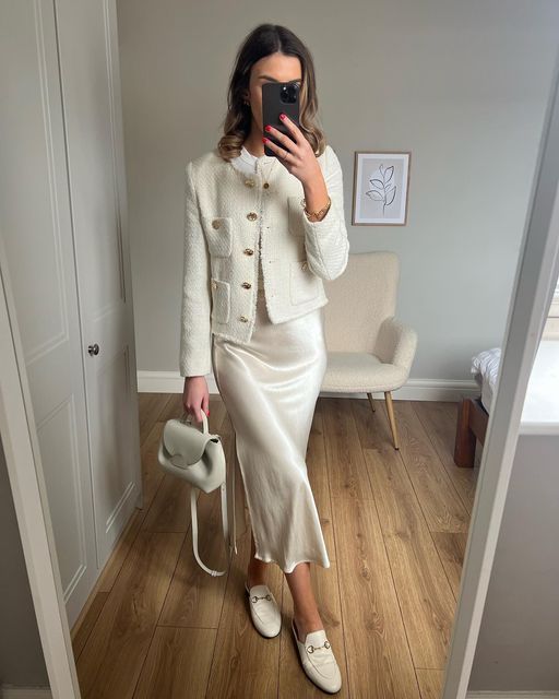 a pearly white slip midi dress, a white cropped tweed blazer, white mules and a small white bag as an Old Money look for spring