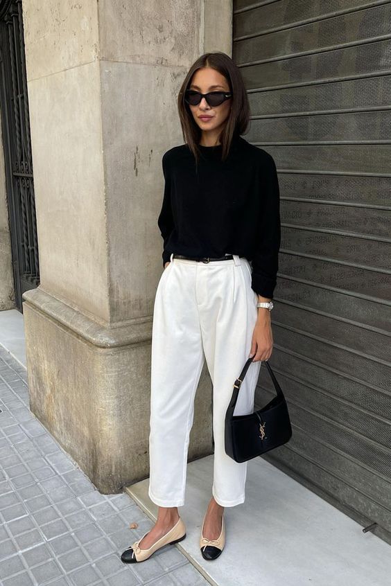 a simple and pretty black and white look with a black long sleeve top, white cropped pants, two-tone shoes and a black baguette bag