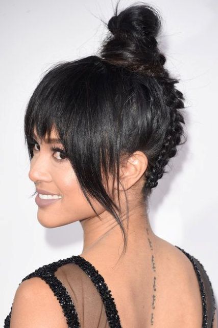 a top knot with a braid on tha back and layered bottleneck and side bangs is a chic and cool idea to try