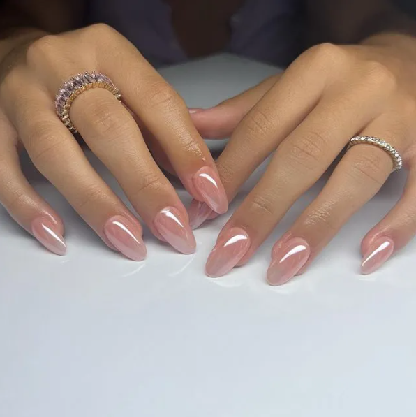 adorable blush glazed nails of almond shape are ultimate, they are super trendy and very feminine