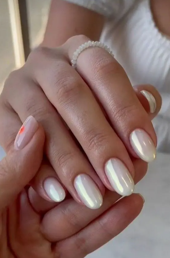 glazed milky nails of oval shape are amazing for any look, this is the newest version of milky nails that are so popular