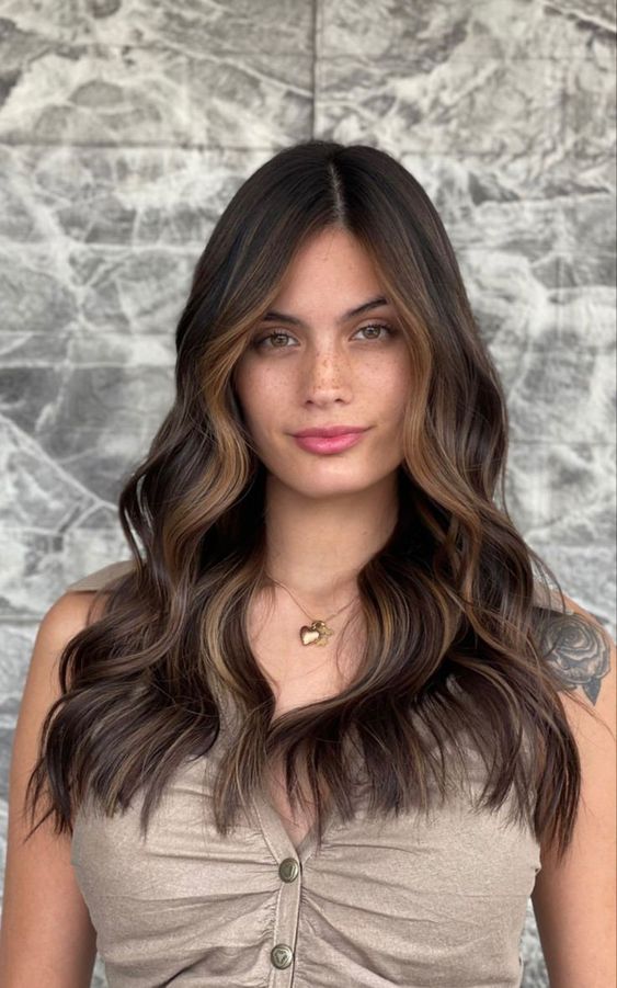 gorgeous long dark brunette hair with caramel contouring and waves is a lovely idea, it looks chic and eye-catchy