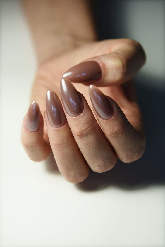 long almond chocolate glazed donut nails are a gorgeous idea, they are trendy both cause of color and finish