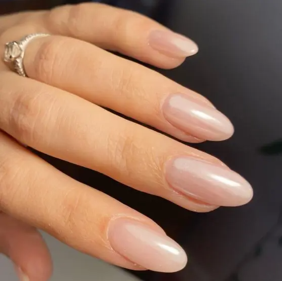 long blush glazed donut nails of an almond shape are amazing for many outfits, this is a fresh take on nude nails