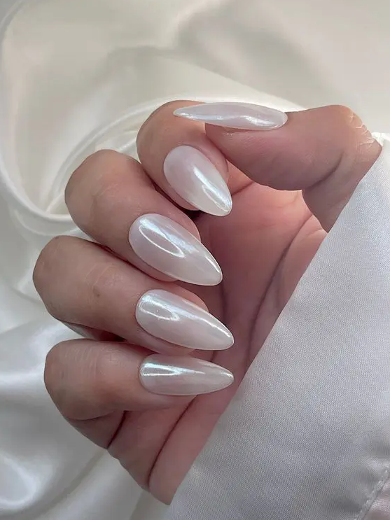 milky chrome long almond nails are the newest milky perfection, they look bold and chic