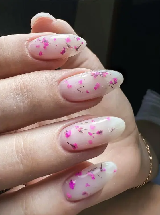 milky nails accented with hot pink and fuchsia dried blooms is a fantastic idea for a summer outfit