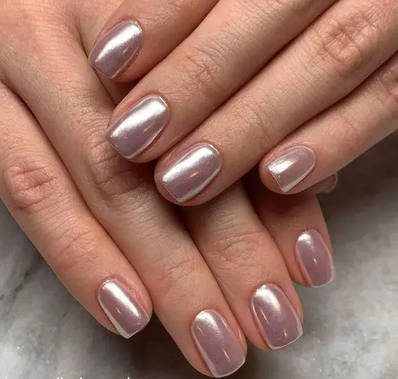 pale pink to lilac chrome short nails will add a slight touch of color to the look and will make your bridal look bolder