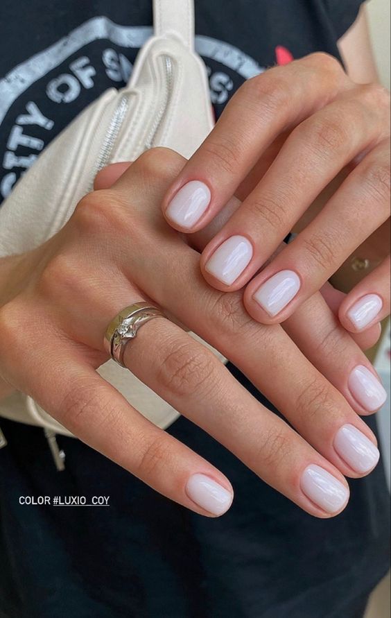 super short oval milky nails are a chic and cool idea, they are comfortable in wearing and match a lot of looks