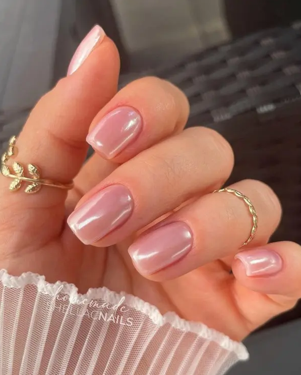 A beautiful pink glazed donut manicure of a comfortable square oval shape is a perfect idea for a no fuss look