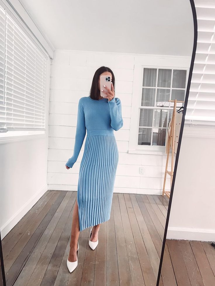 a blue midi dress with long sleeves and a side slit plus white shoes are a cool combo for a bridal shower